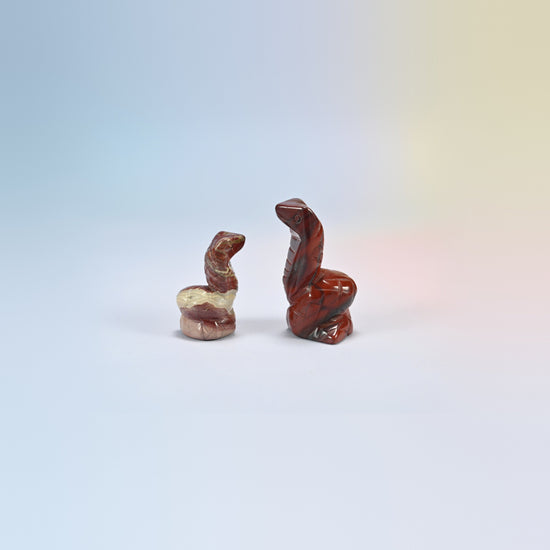Cobra snake crystal carving in red jasper, brick red natural stone