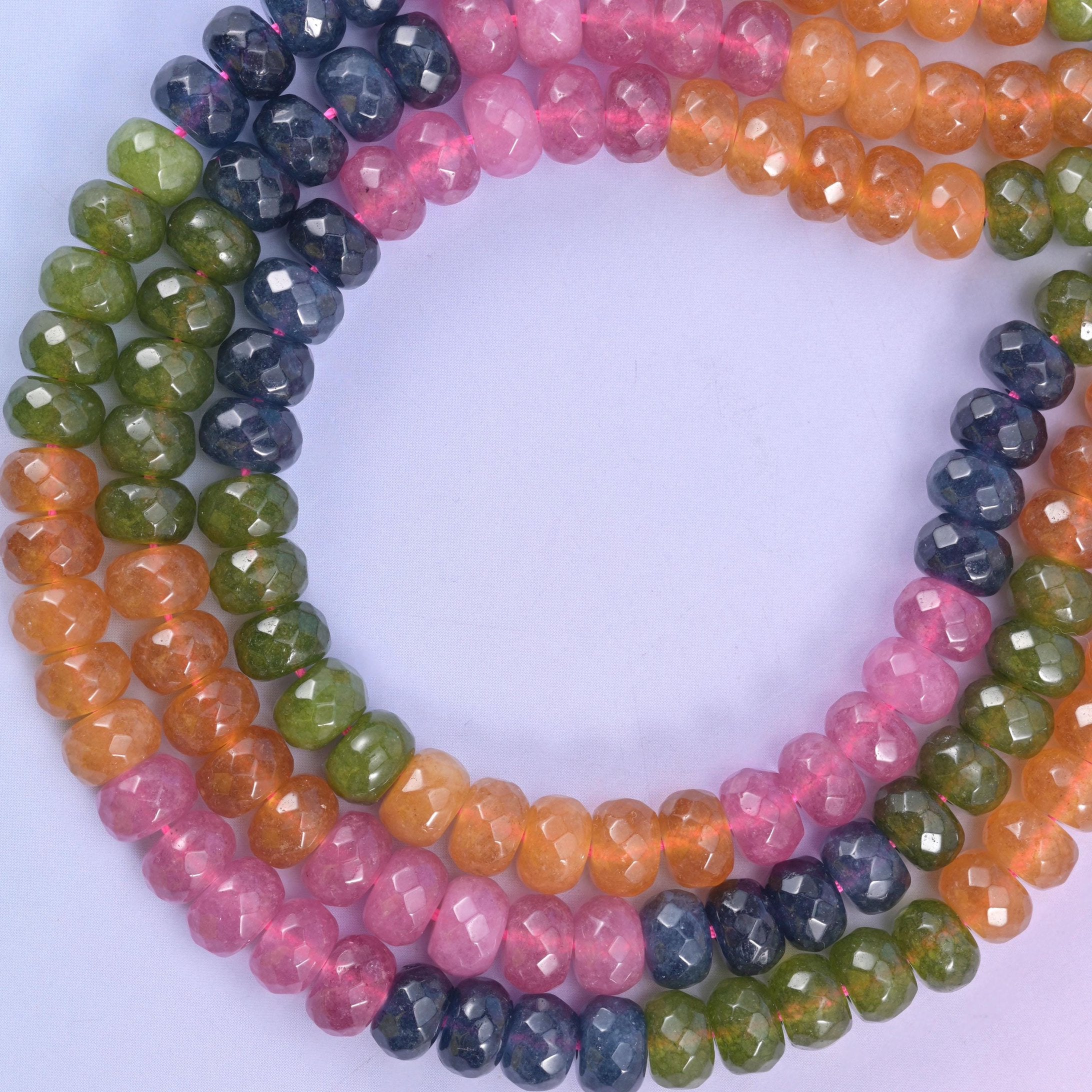 Tourmaline color dyed jade rondelle beads, approximately 73 beads per strand
