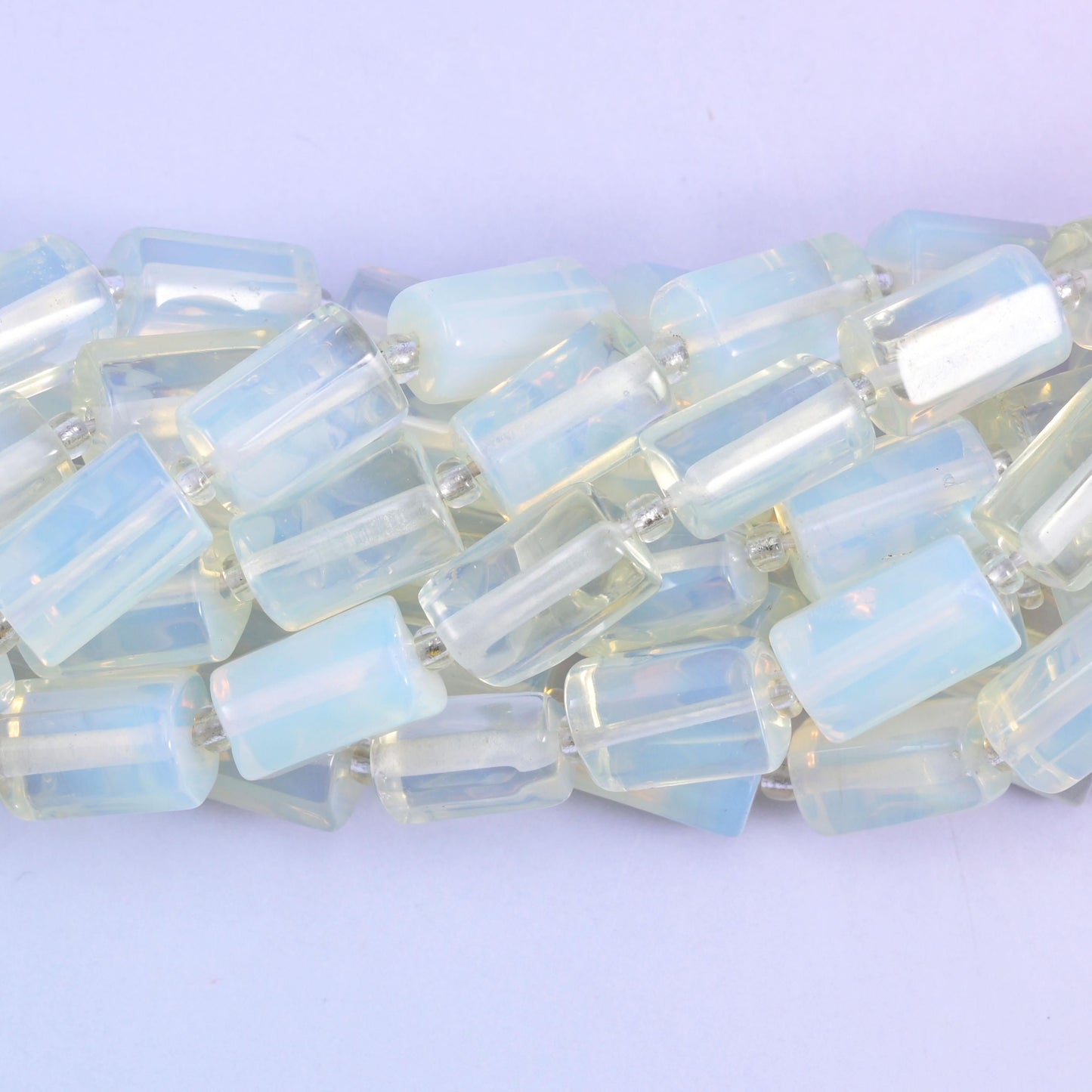 Faceted tube cut Opalite beads