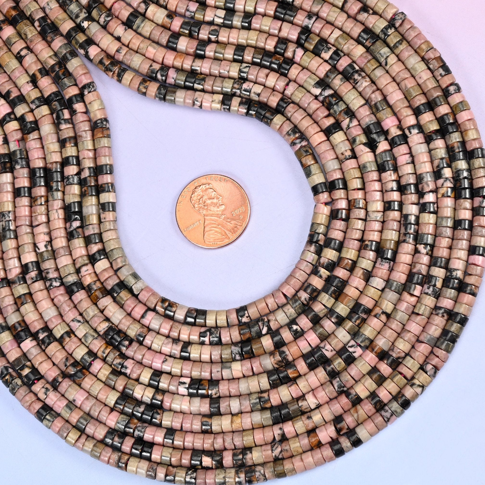 Rhodonite Smooth Heishi Disc Beads, approximately 180 beads per strand