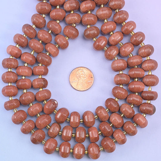 Gold sandstone smooth pumpkin beads, man-made glass in warm brown-red with copper glitter