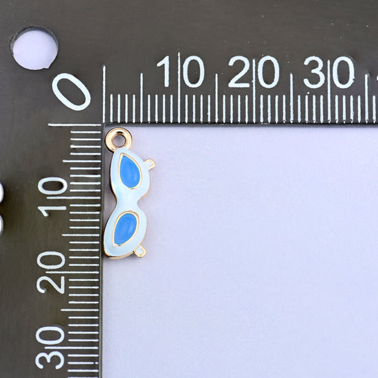 White and blue sunglasses charm measured at 18.02 x 6.84mm including the small ring.