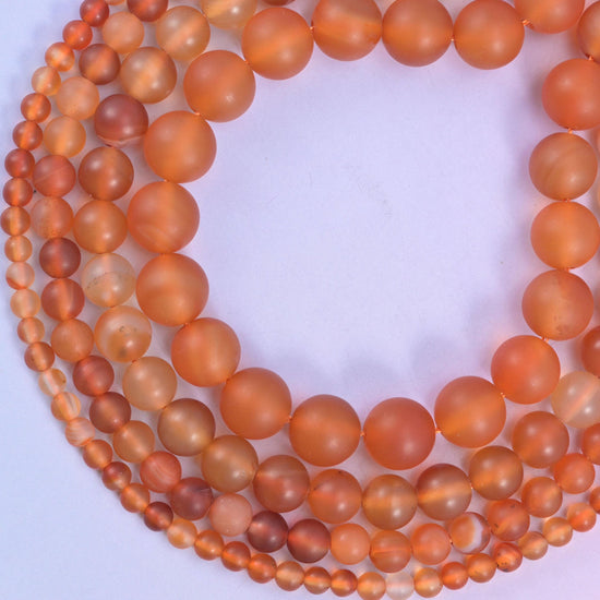 Orange Carnelian round beads, up to 88 beads per strand