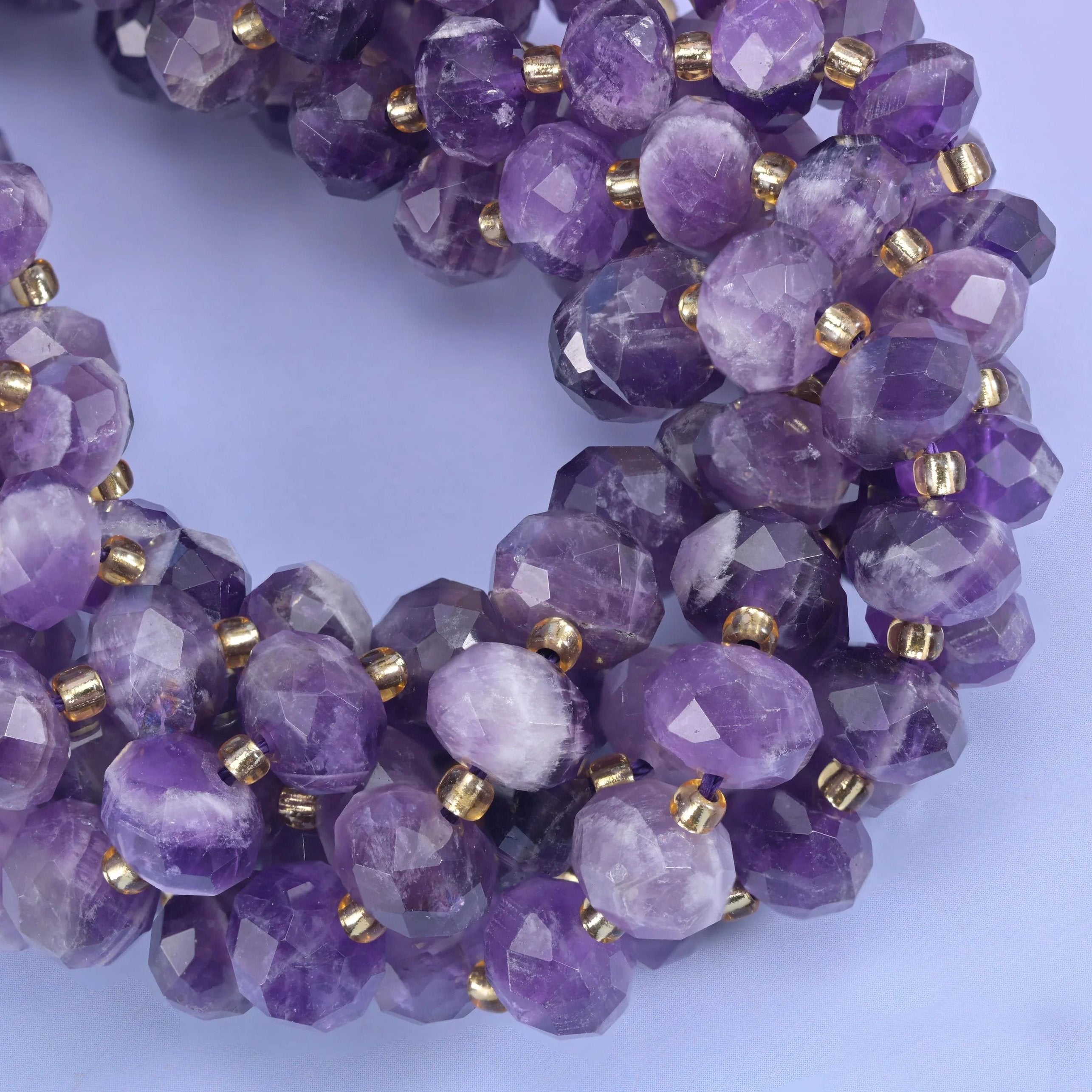 Faceted rondelle cut chevron amethyst beads