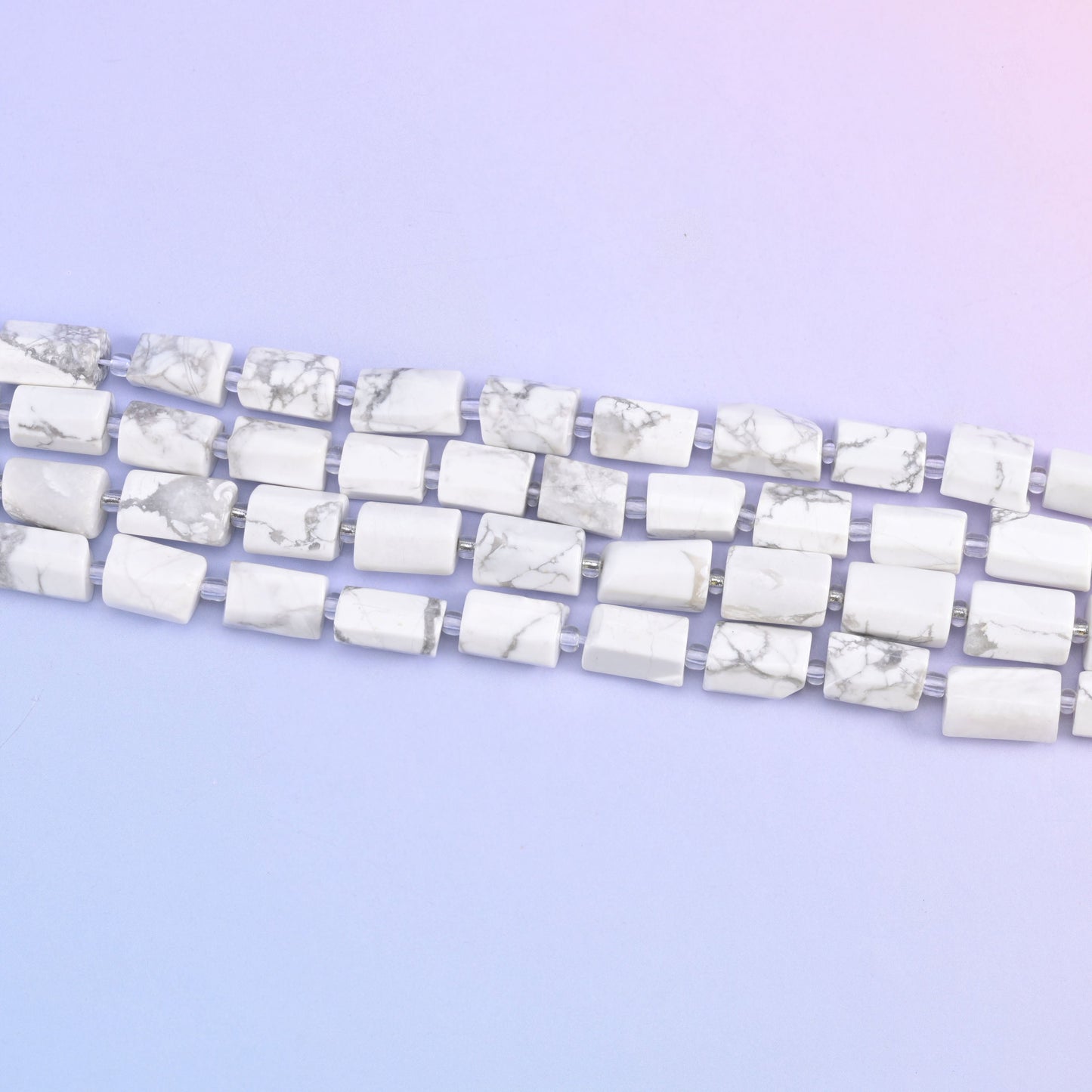 White Howlite faceted tube beads in a clean white gemstone tone