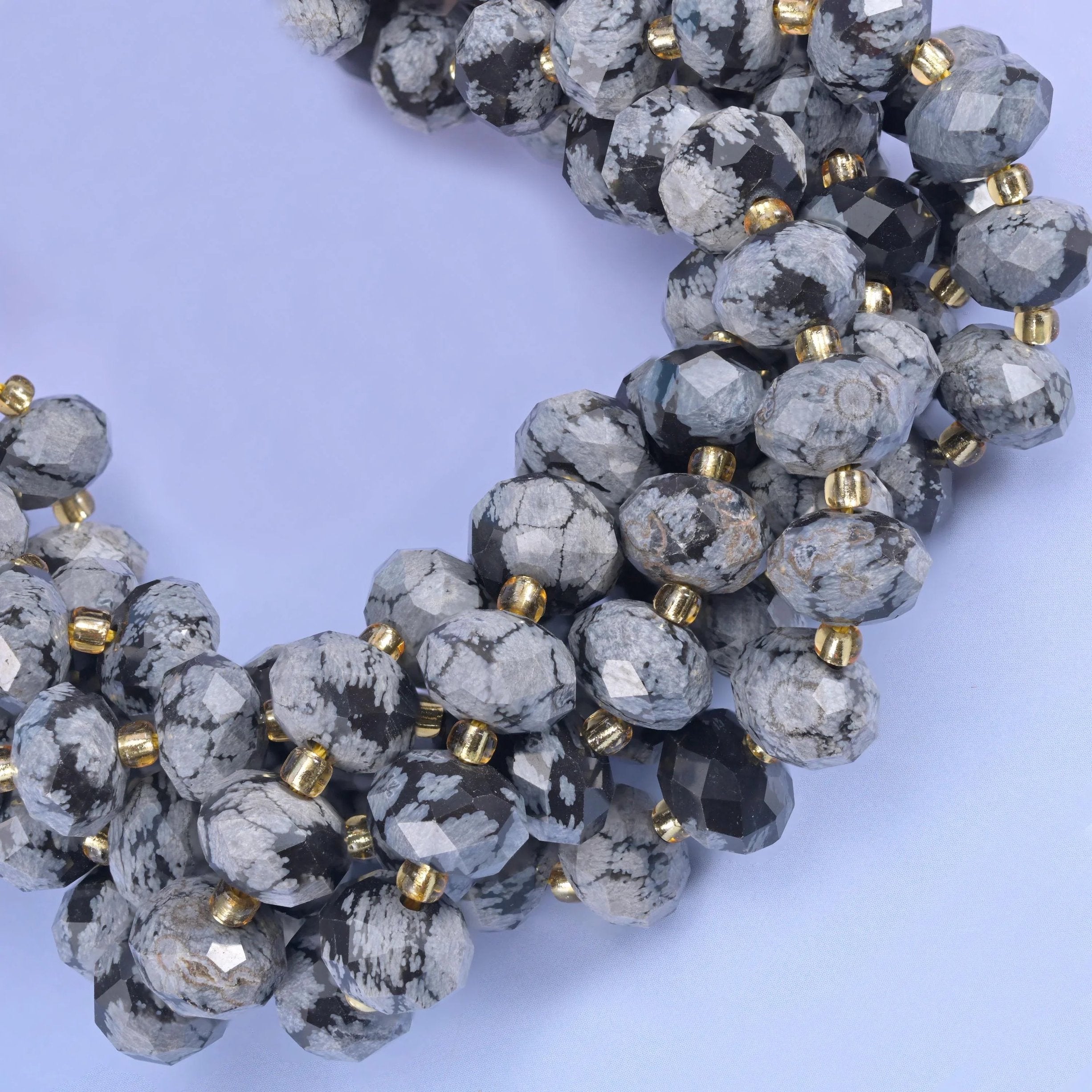 Faceted rondelle cut snowflake jasper beads