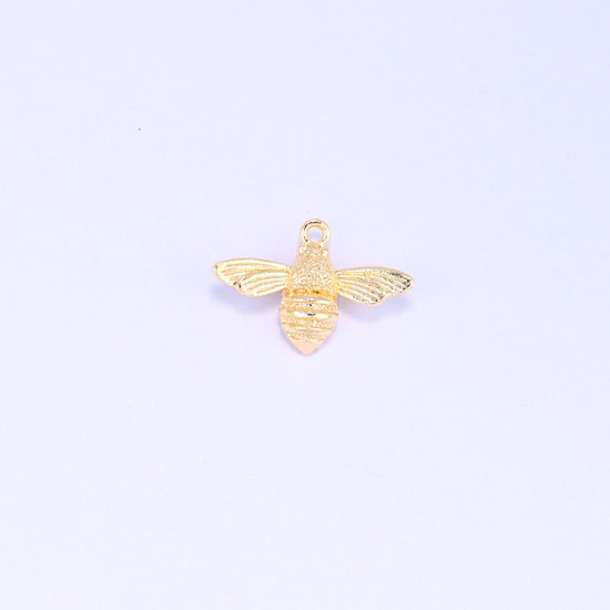 Small gold charms bee, single 18K gold plated brass charm shown front on with wings spread