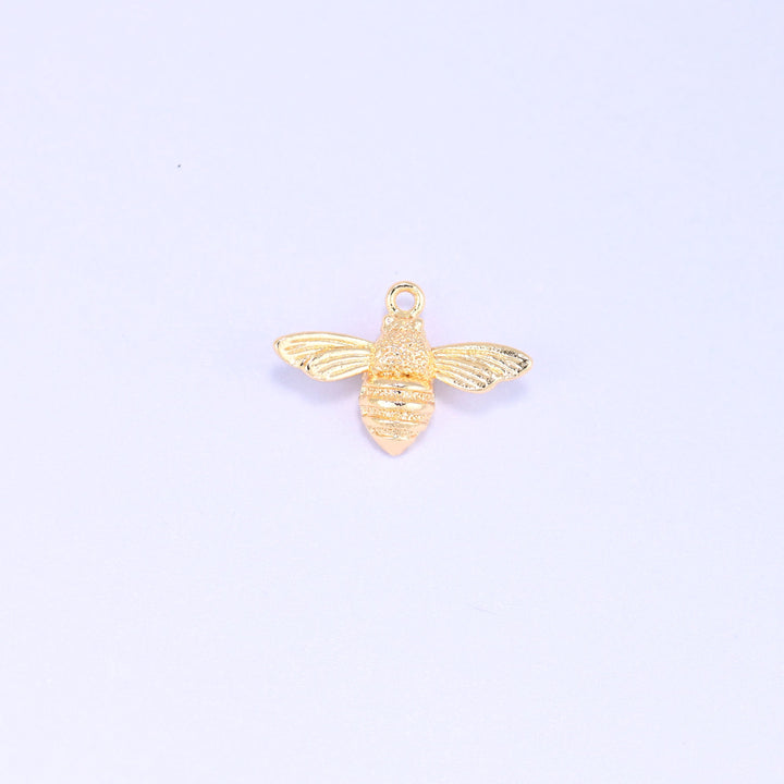 Small gold charms bee, single 18K gold plated brass charm shown front on with wings spread