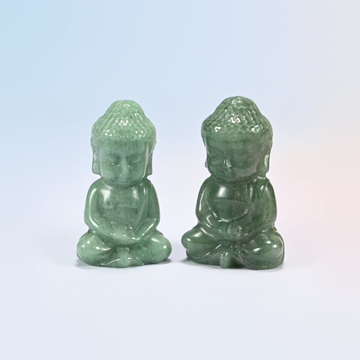 Two natural green aventurine sitting Buddha carvings in soft green, 2 inch