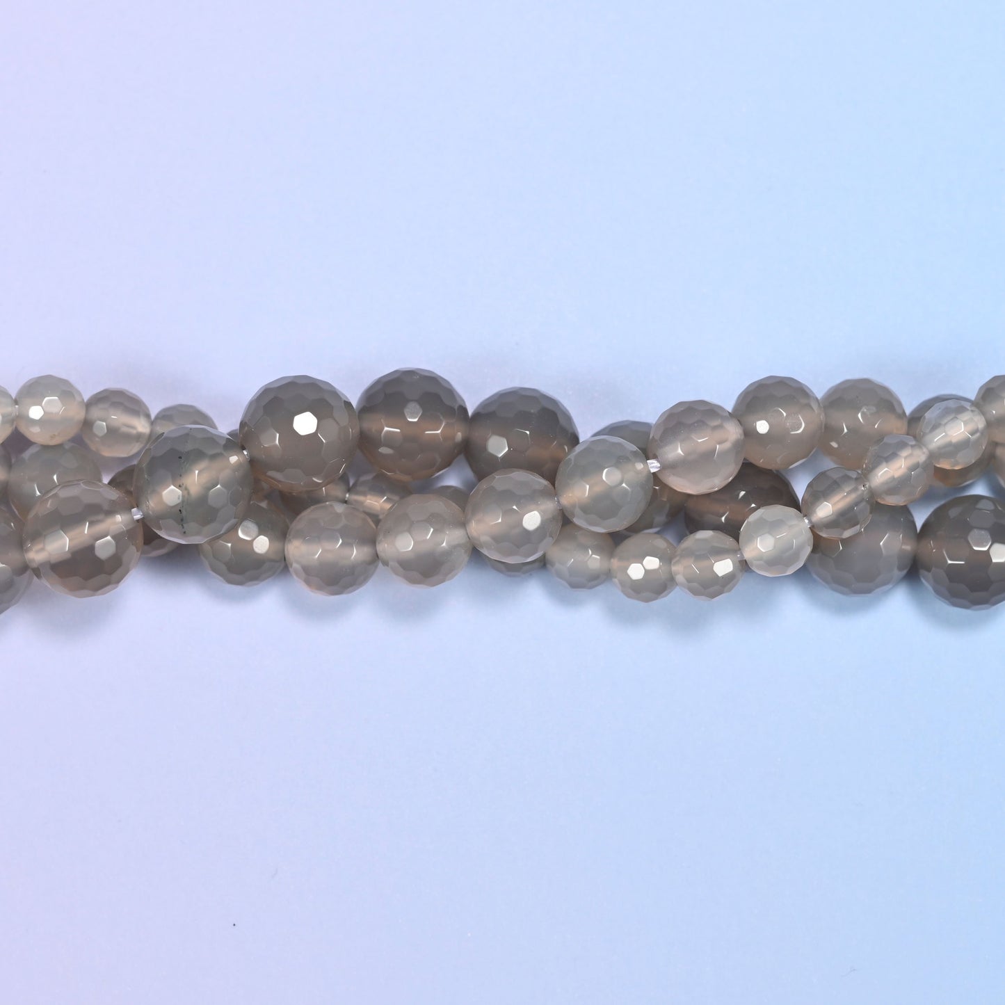 End detail of a gray agate beaded strand (15-inch strand), showing bead spacing.