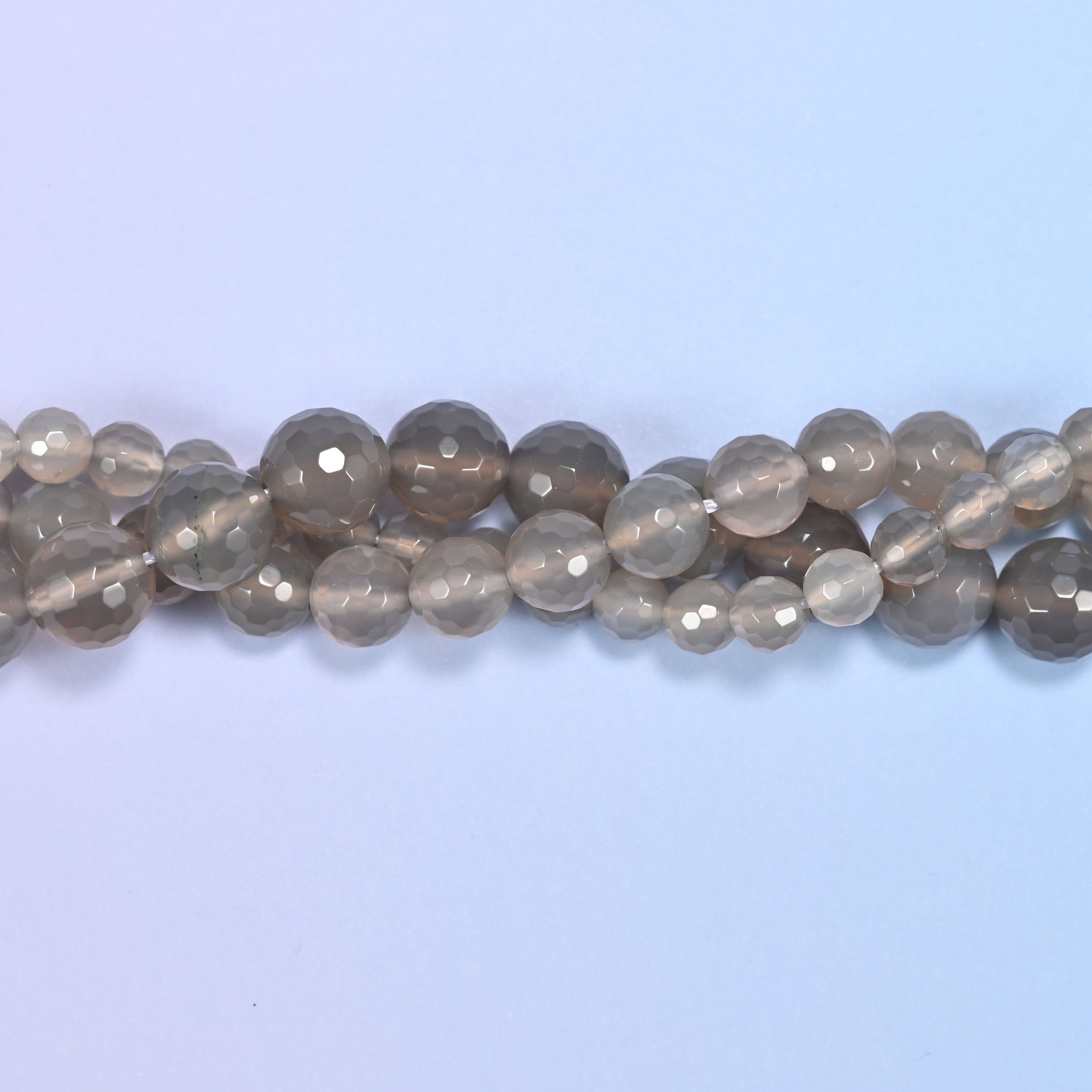 End detail of a gray agate beaded strand (15-inch strand), showing bead spacing.