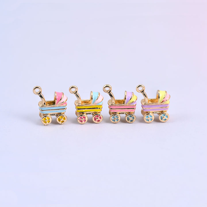 All four stroller charms in a row: light blue, yellow, pink and light purple enamel bodies.