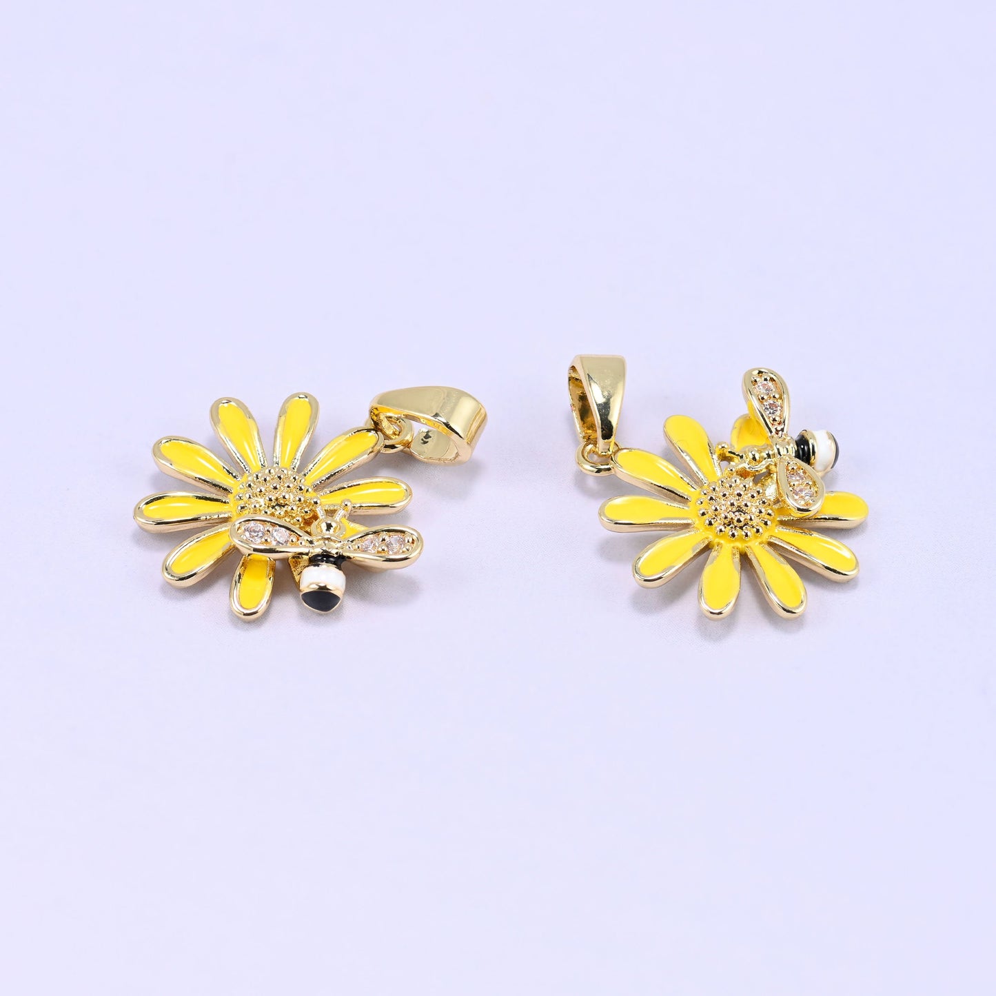 Brass sunflower and bee charm with sparkling zircon accents