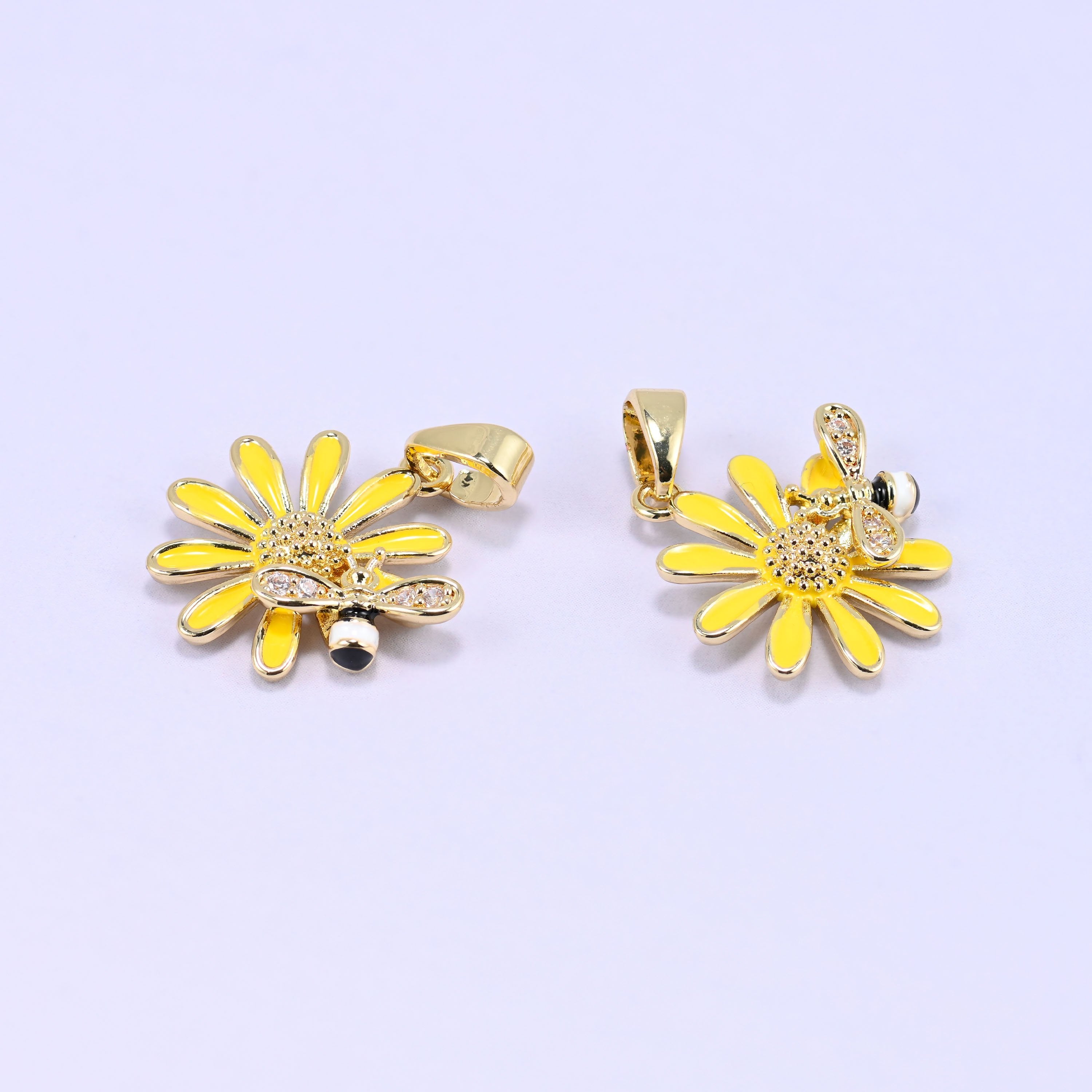 Brass sunflower and bee charm with sparkling zircon accents