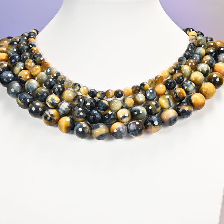 Gold blue dream tiger eye faceted round beads on a white necklace display, offered in 6mm, 8mm, 10mm and 12mm