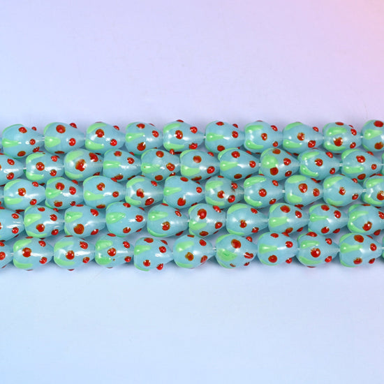 Light Blue Red Dots Strawberry Glass Beads in soft powder-blue with a pale green leaf panel