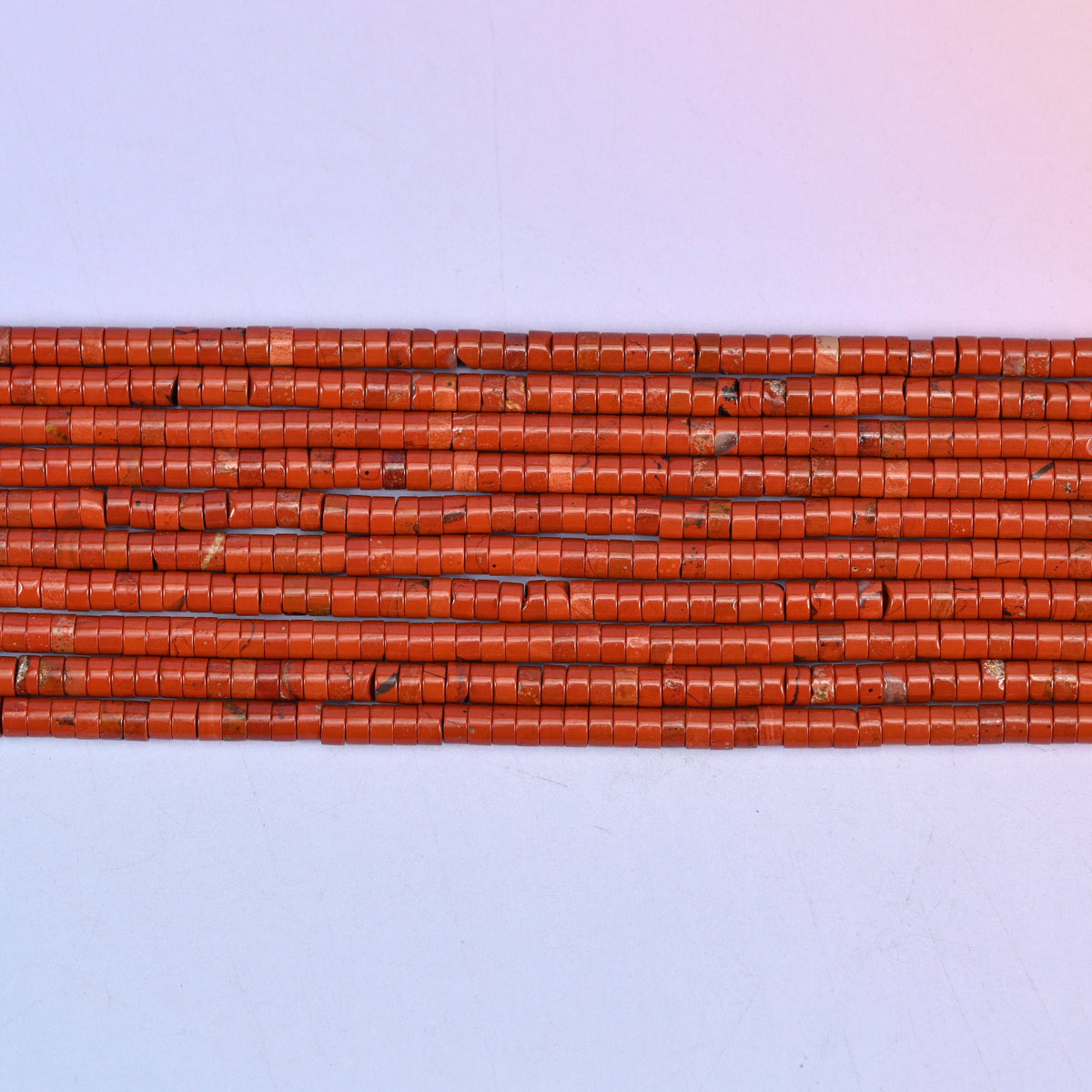 Red Jasper Smooth Heishi Disc Beads in rich brick-red with subtle earthy inclusions