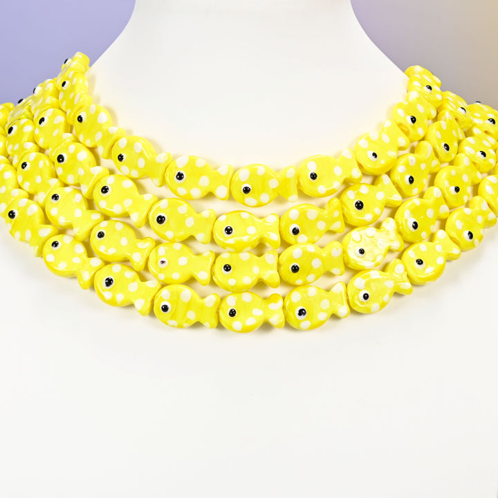 Fish glass beads, yellow with white dots, 19x12mm