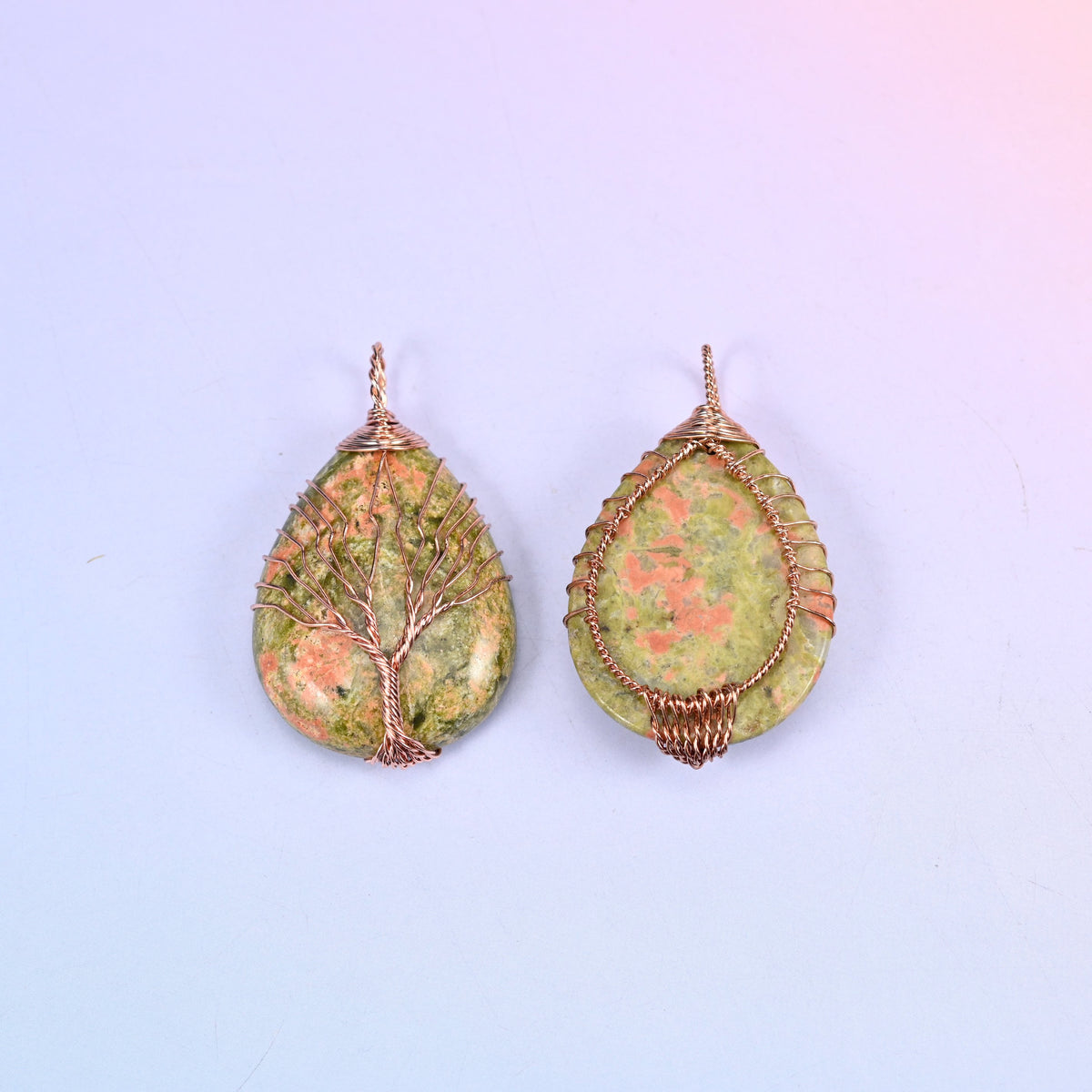 Teardrop Crystal Pendant with Copper Wired Tree in unakite, front and reverse pair showing how the copper wire crosses the back of the cabochon.