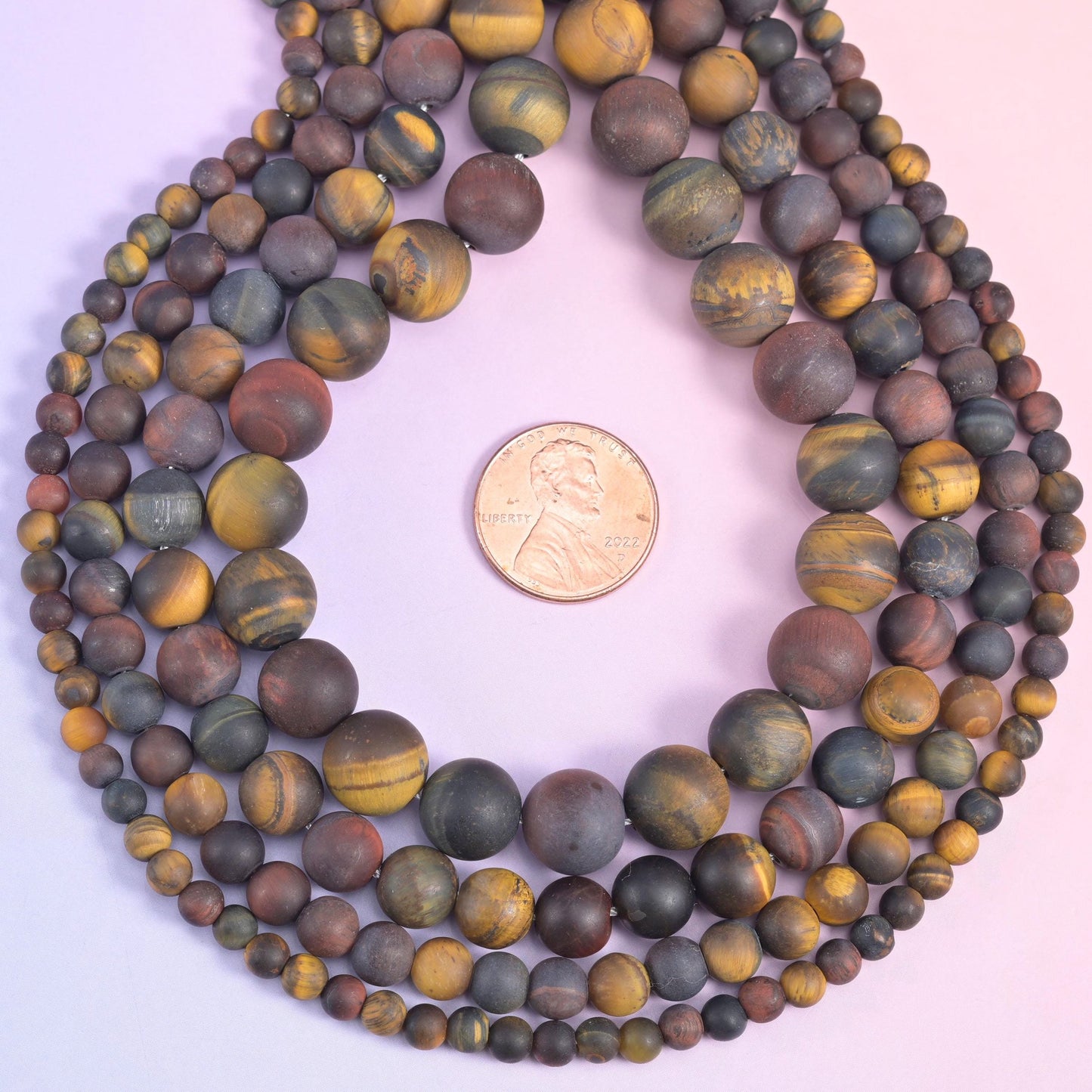 Tricolor Tiger Eye Matte Round Beads, sanded to a matte finish that mutes the usual glassy shine