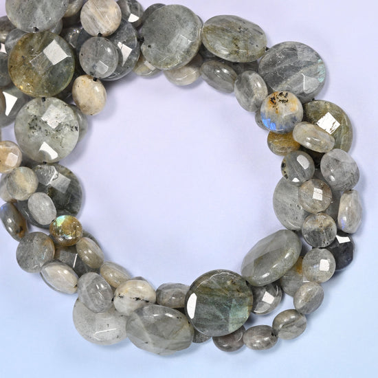 Gray Labradorite faceted coin beads coiled tight, cream and silver discs with dark speckling on some