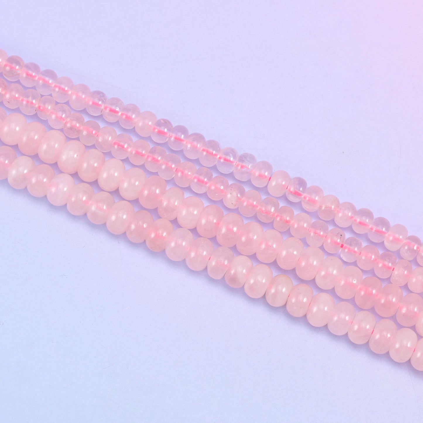 Rose Quartz rondelle beads in pale blush to deeper rose pink tones