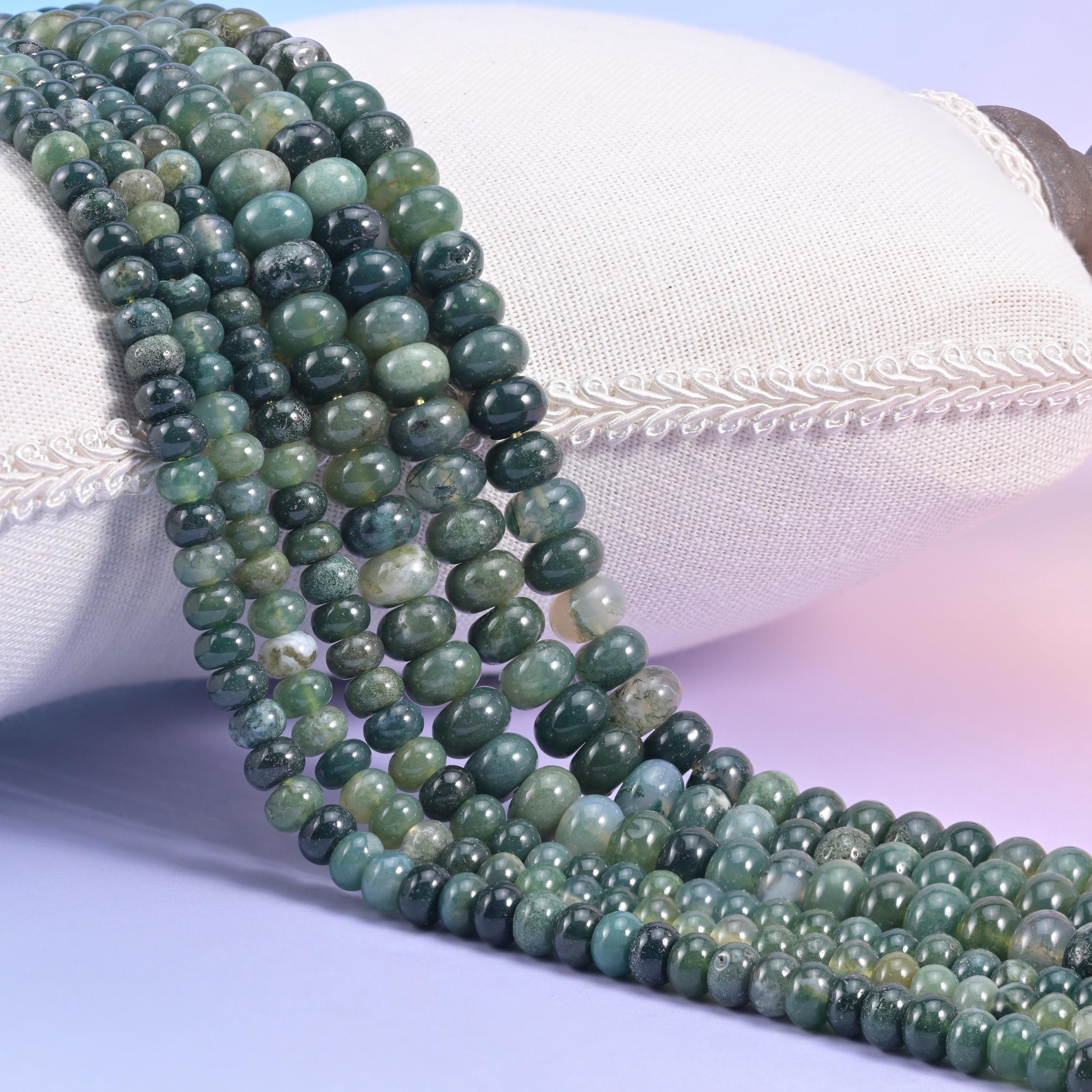 Natural Moss Agate smooth rondelle beads in deep forest green with translucent mossy inclusions