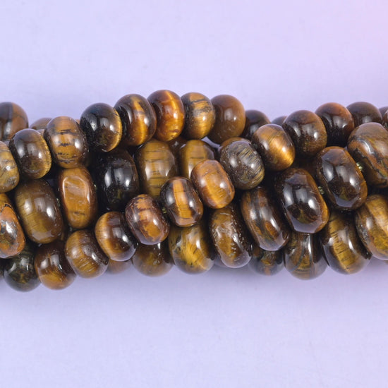 Rondelle cut Tiger Eye beads with a smooth polished finish