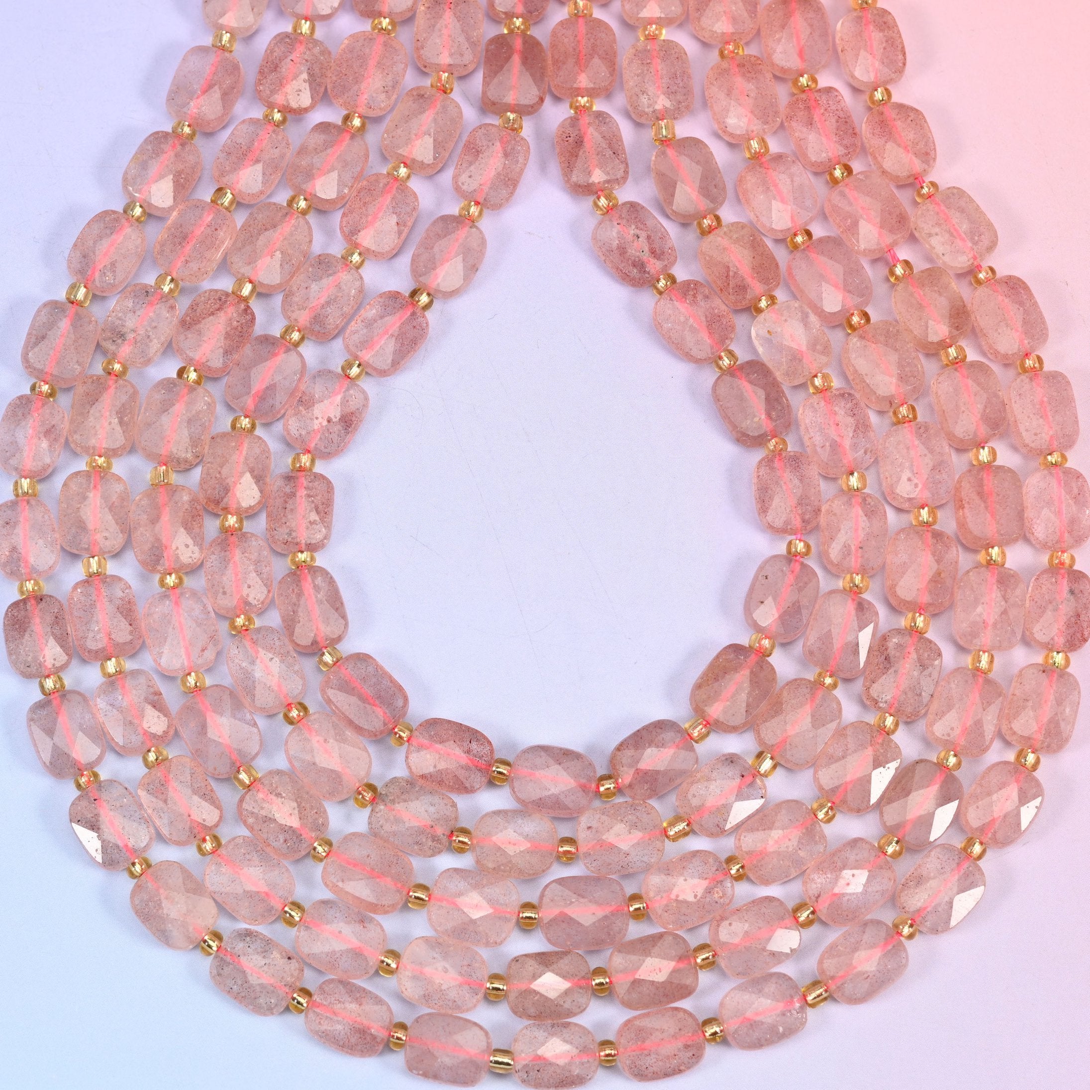 Strawberry quartz faceted rectangular beads with softened corners and shallow facets