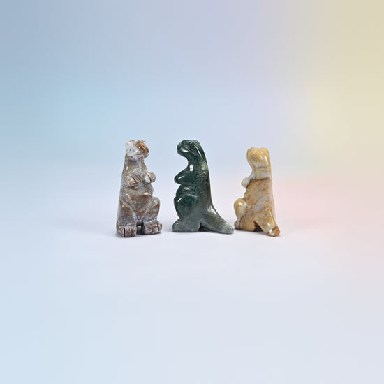 Three Indian agate T-Rex dinosaur crystal carvings, 2 inch, mixed gray, green and tan natural stone