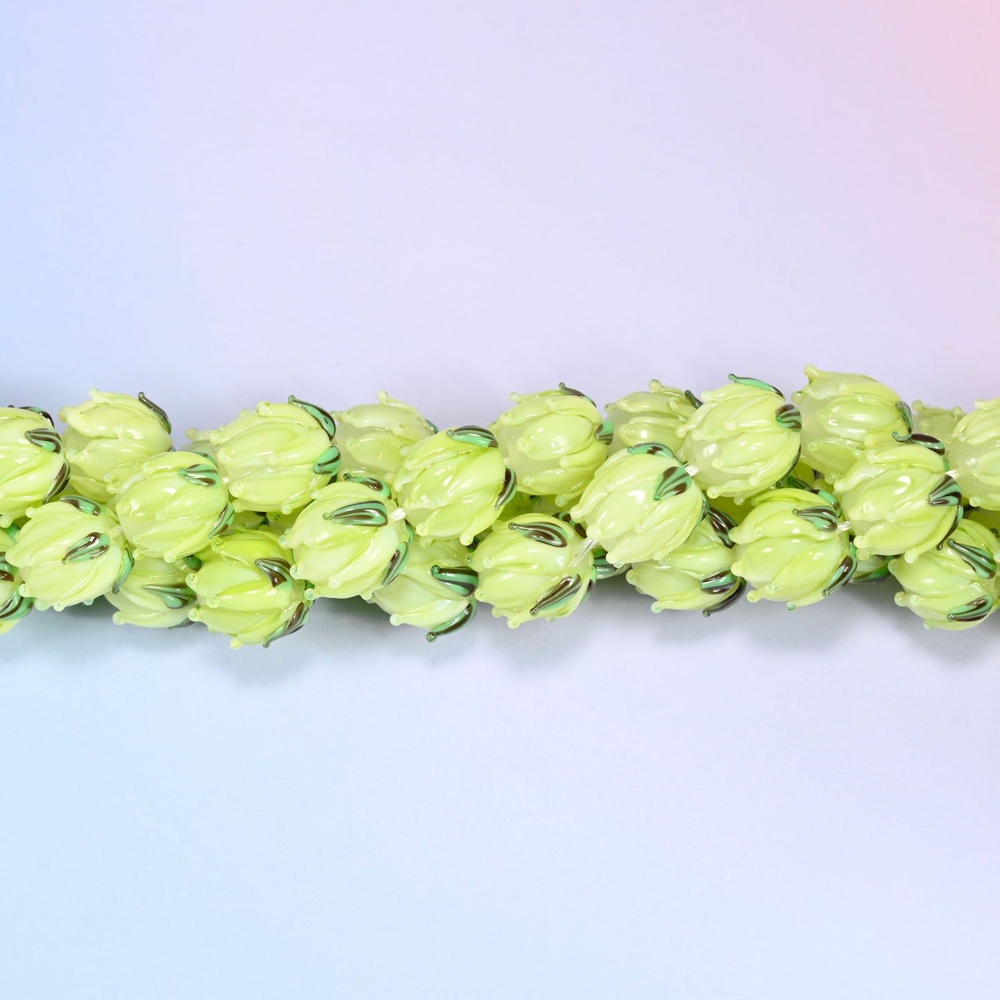 Lime green tulip flower bud lampwork glass beads, approximately 20 beads per strand