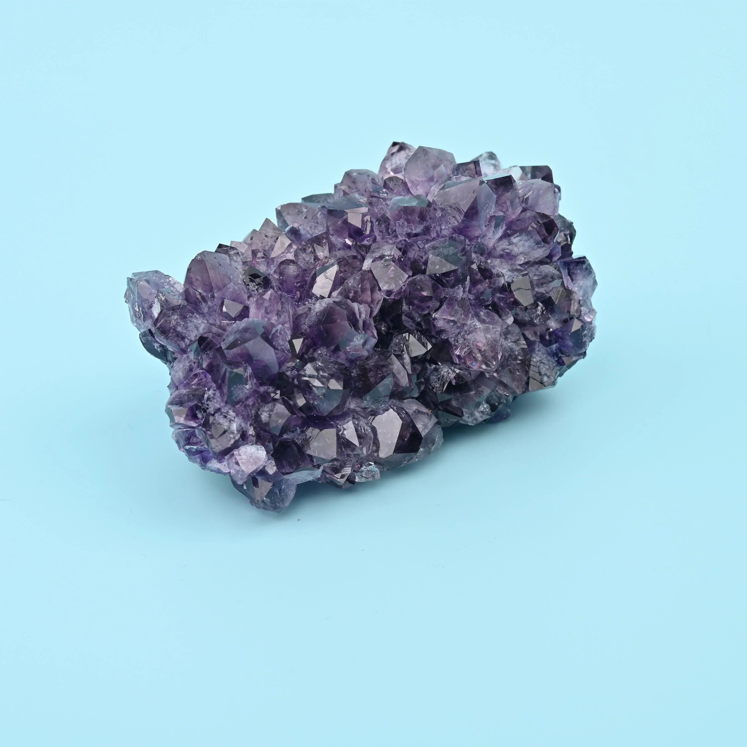 Amethyst quartz cluster, 2 inches tall, 4 inches wide.
