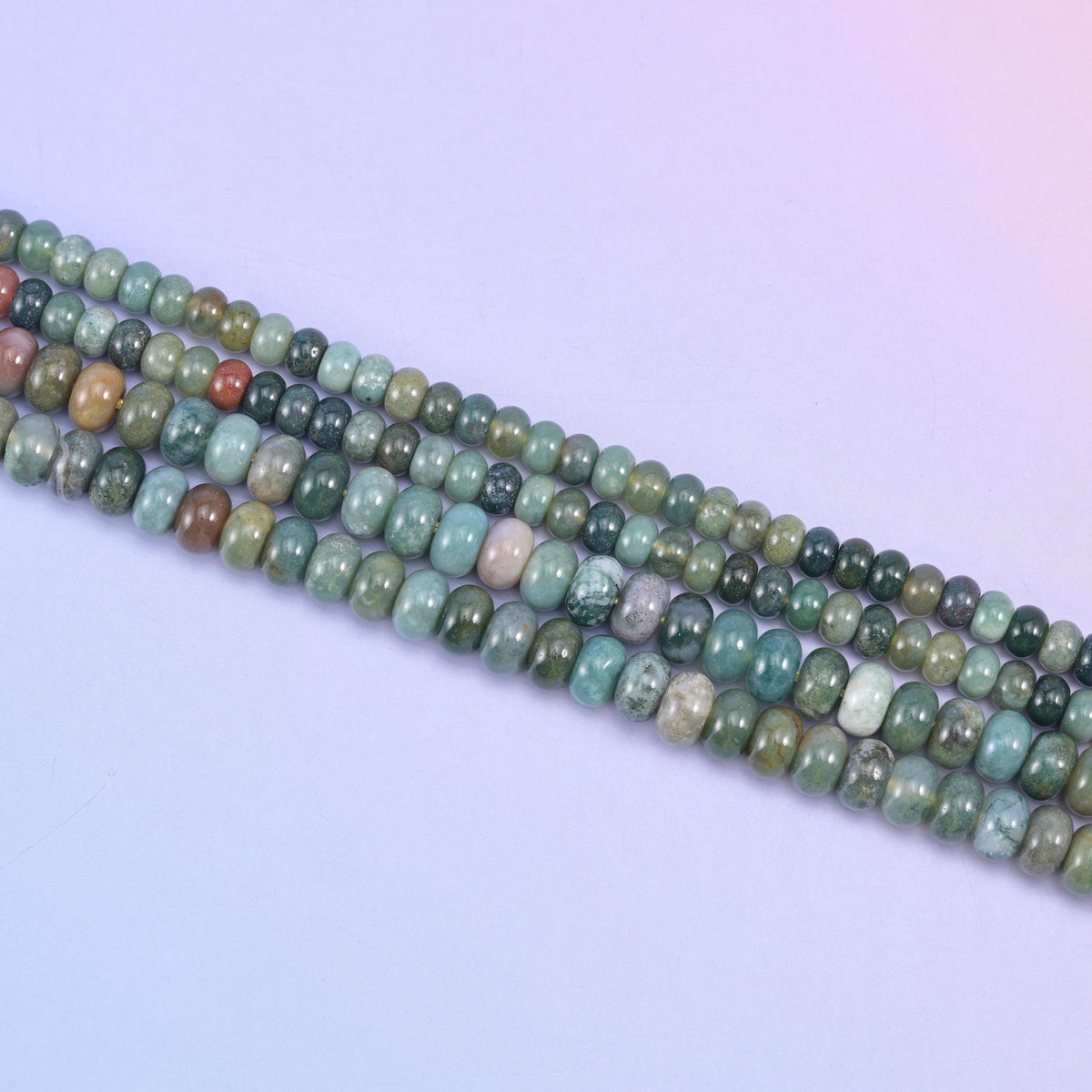 Indian Agate rondelle beads in mossy green, cream, dusty mauve, and rust orange tones