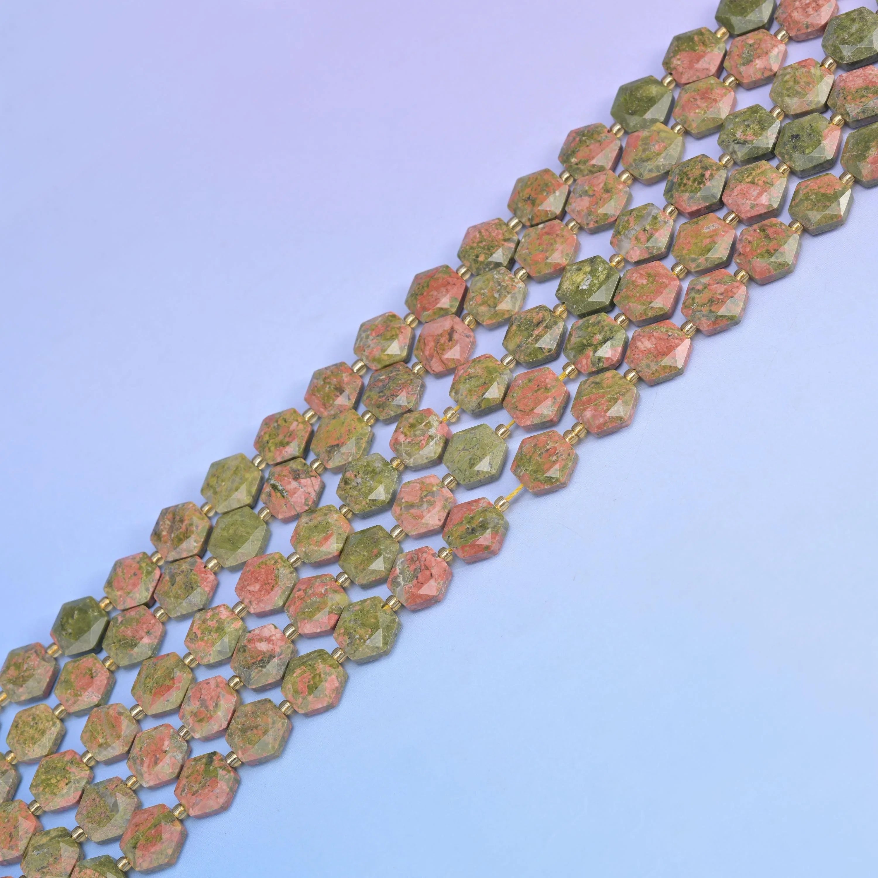 Unakite in olive and moss green blotched with salmon pink.