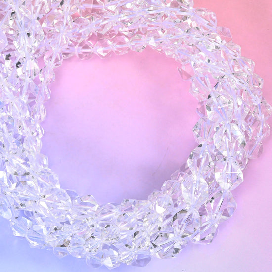 Clear Quartz diamond star cut beads coiled into a tight loop, centre drilled and star faceted