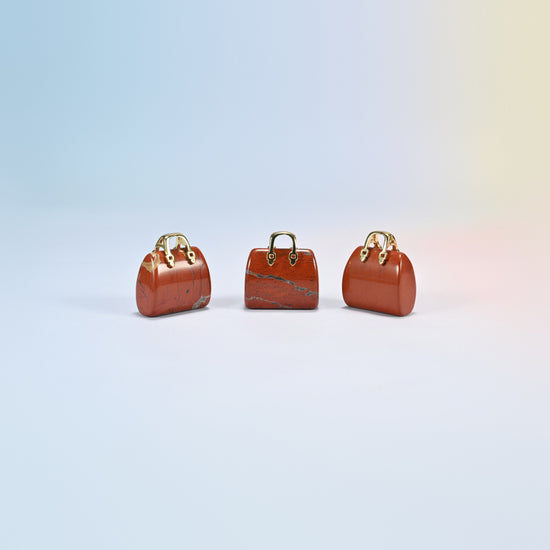 Three red jasper purse crystal carvings, 1 inch, brick red natural stone, gold-tone handle