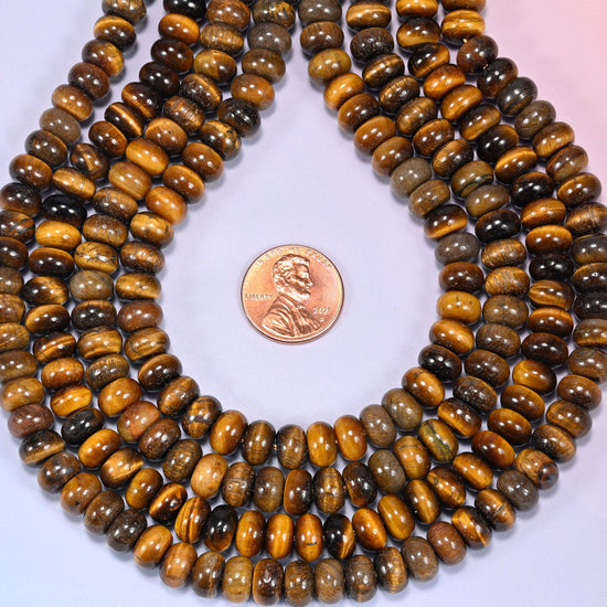 Natural Tiger's Eye Rondelle Beads, approximately 72 beads (5x8mm) or 60 beads (6x10mm) per strand.