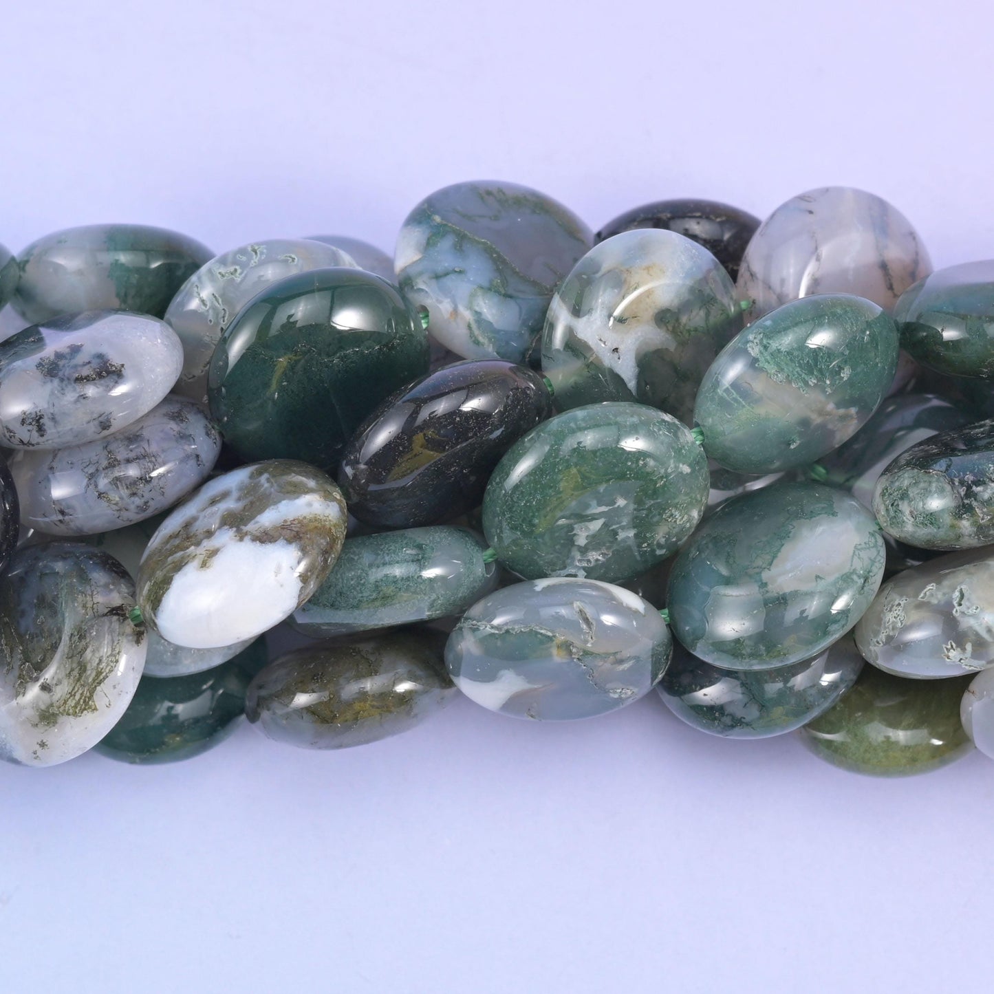 Coin cut Moss Agate beads with a smooth glassy finish
