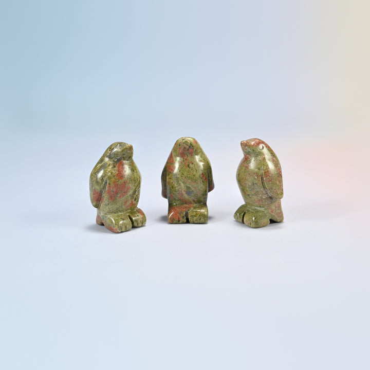 Three unakite penguin crystal carvings, 1.5 inch, green and pink natural stone