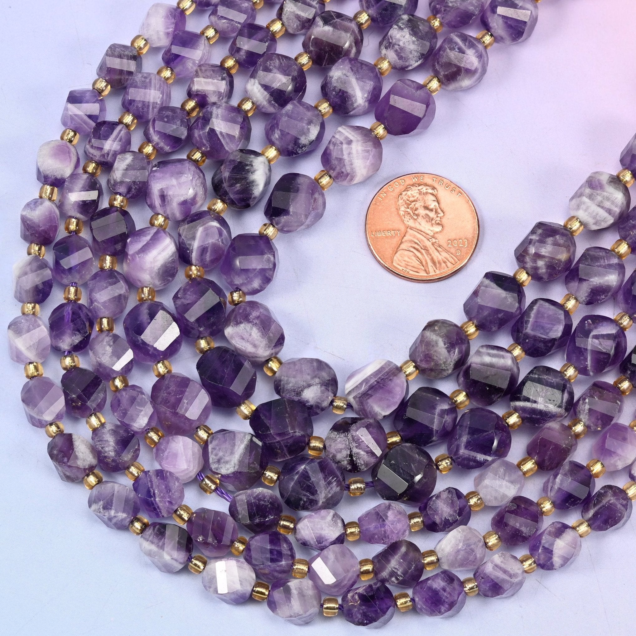 Faceted spiral twist cut chevron amethyst beads