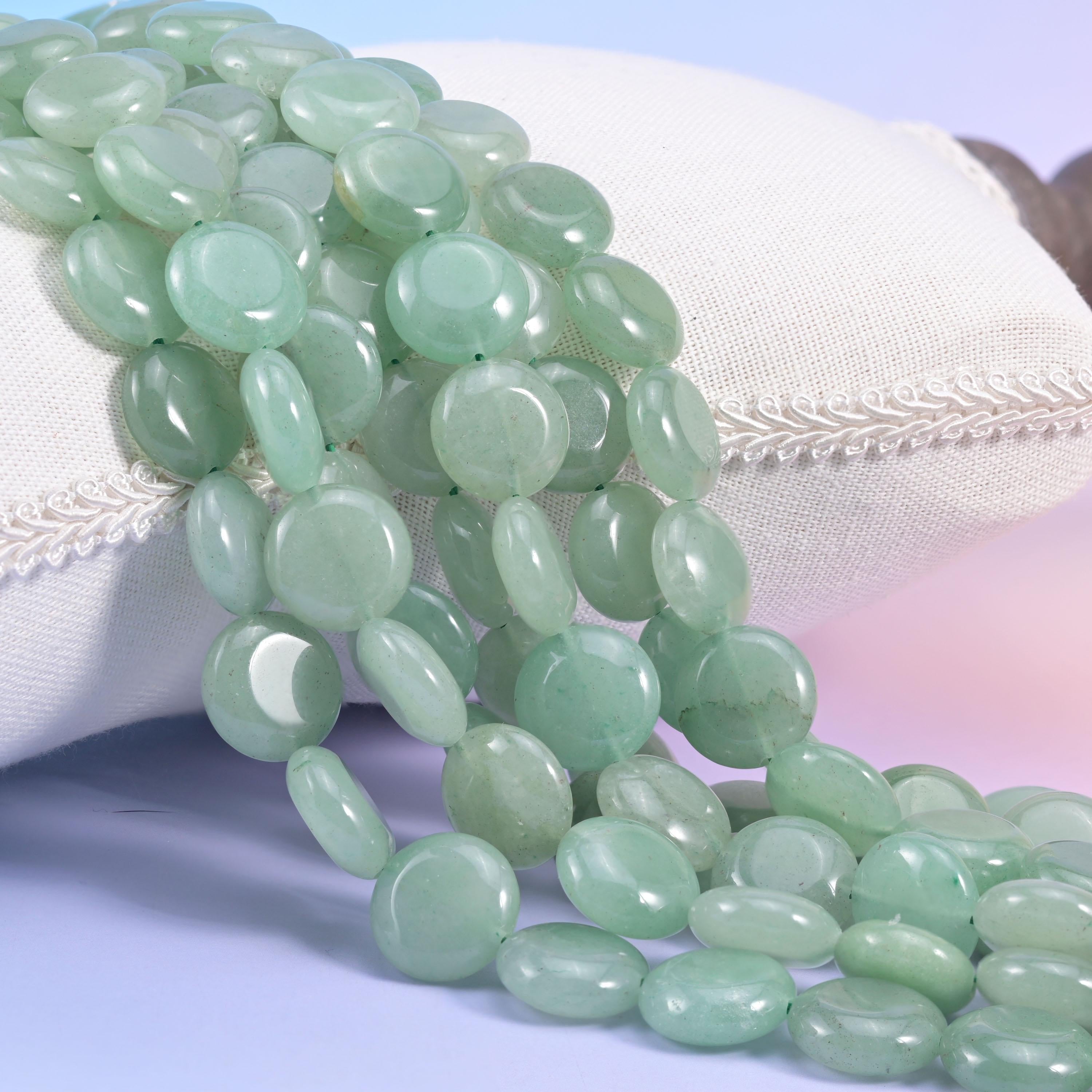 Natural Green Aventurine smooth coin beads in soft sage green with cloudy paler patches
