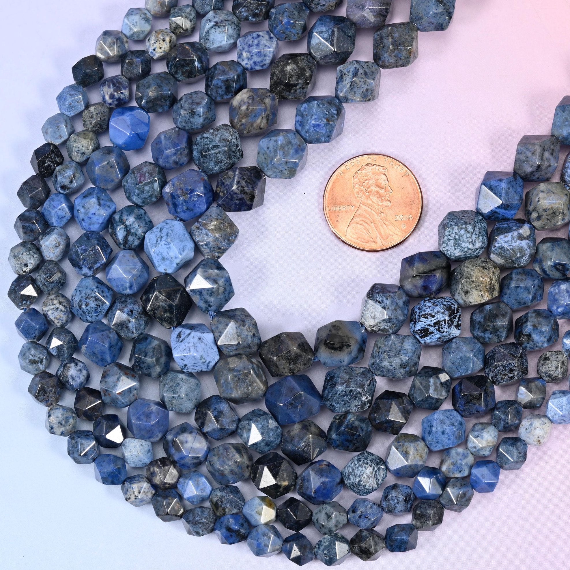 Faceted diamond star cut cut blue dumortierite beads