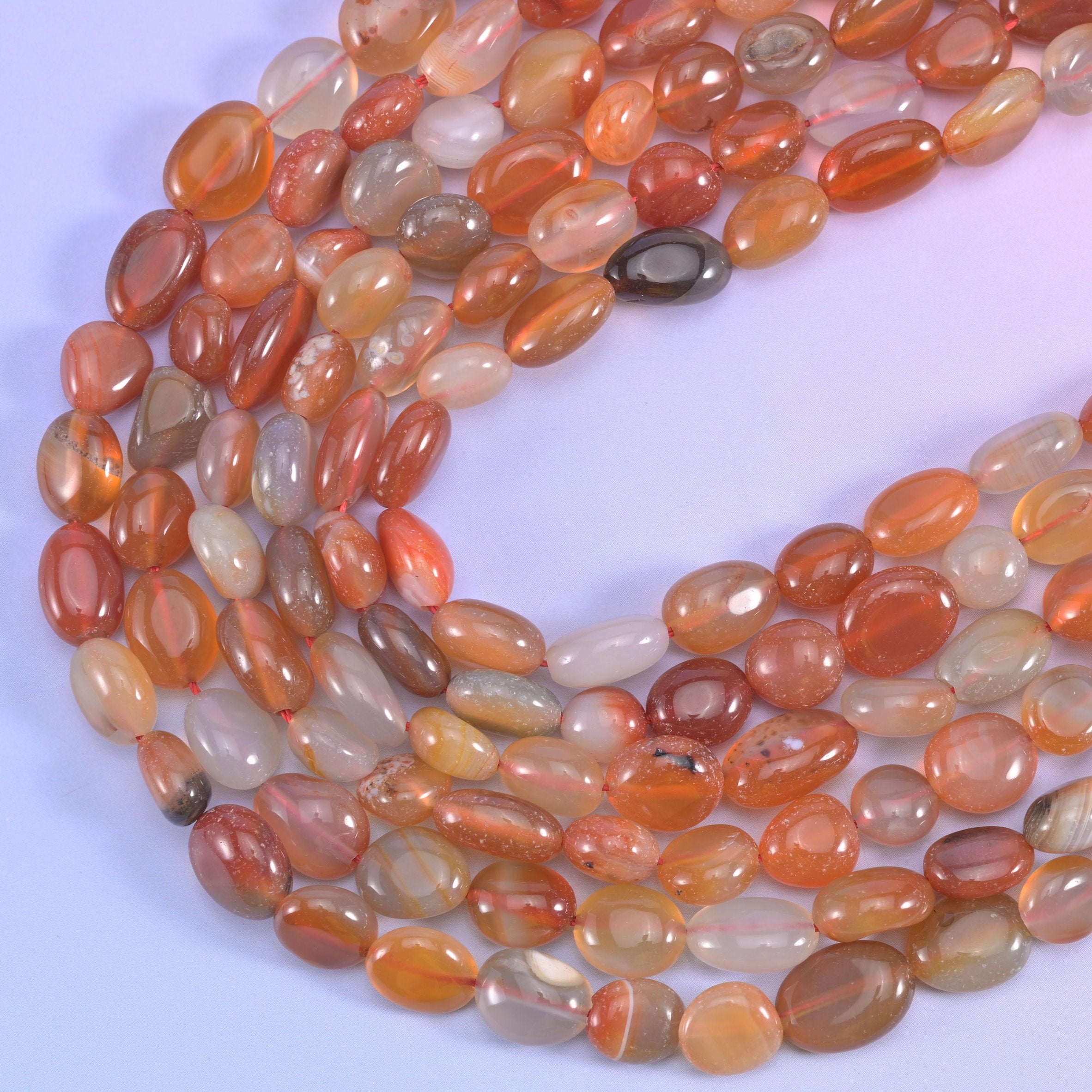 Red orange Botswana pebble nugget beads, 15.5 inch strand