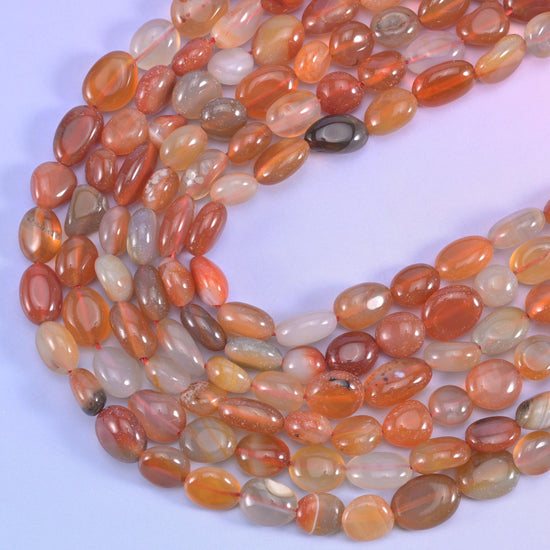 Red orange Botswana pebble nugget beads, 15.5 inch strand