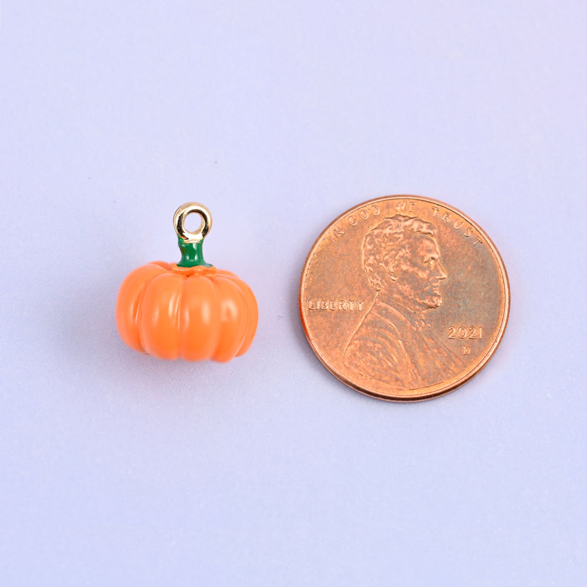 Enamel pumpkin charms, single charm at 12.57 x 13.21mm including the ring and about 7.71mm thick.
