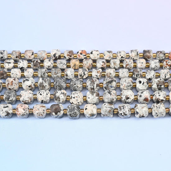 Yooperlite Faceted Cube Beads in pale grey and off-white with dark speckling