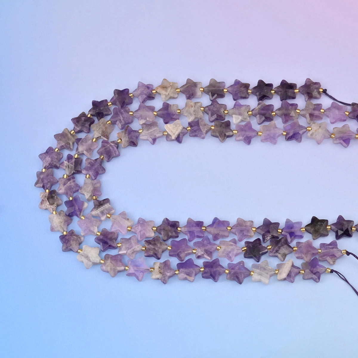 Amethyst Faceted Five Pointed Star Beads 14mm in milky near-white through pale lilac to medium violet
