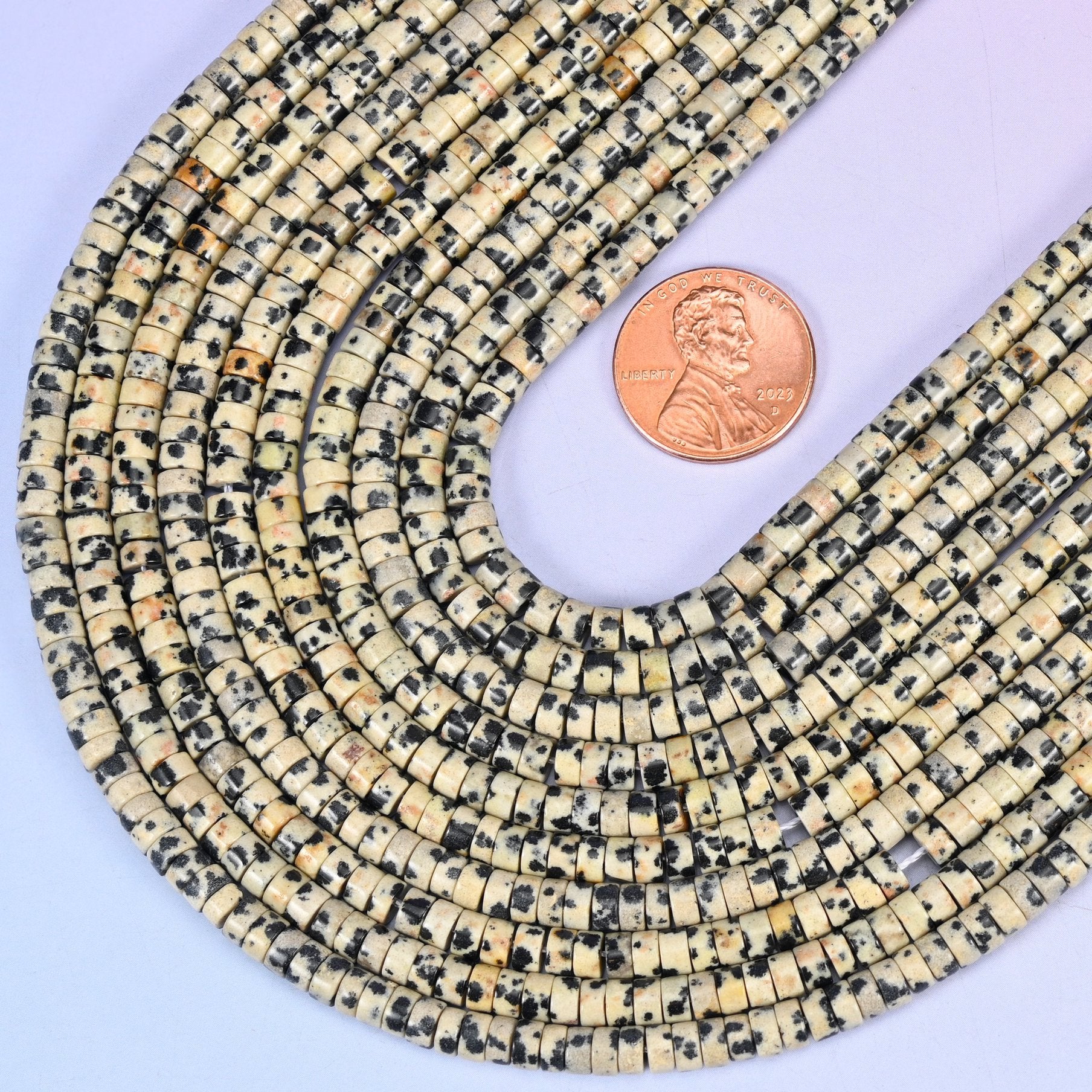 Smooth heishi disc cut Dalmatian Jasper beads