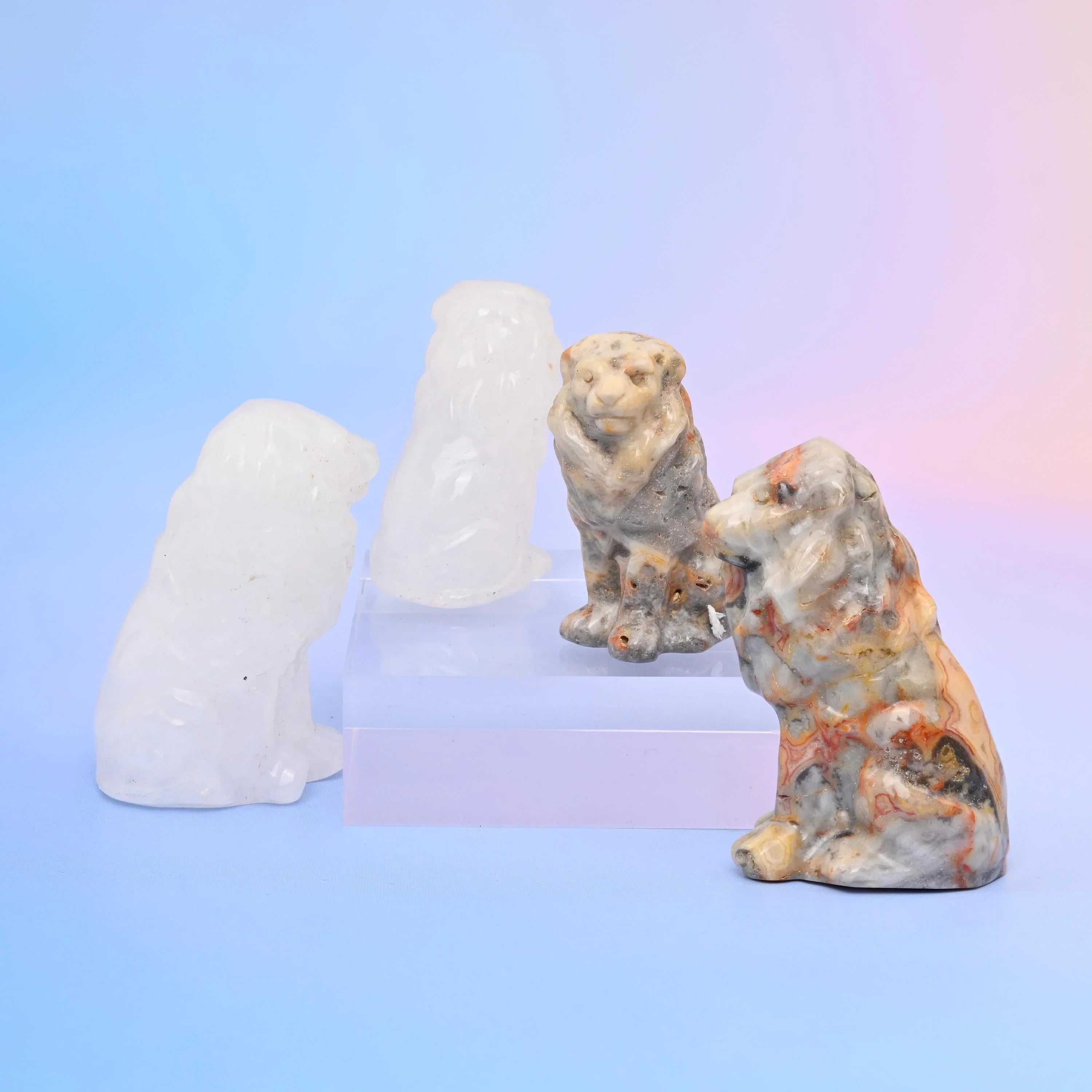 Lion Crystal Carving in rose quartz, tiger eye, amethyst and other natural stones.