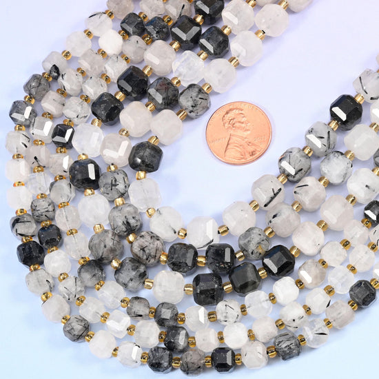 Faceted cube with cut corners cut black rutilated quartz beads